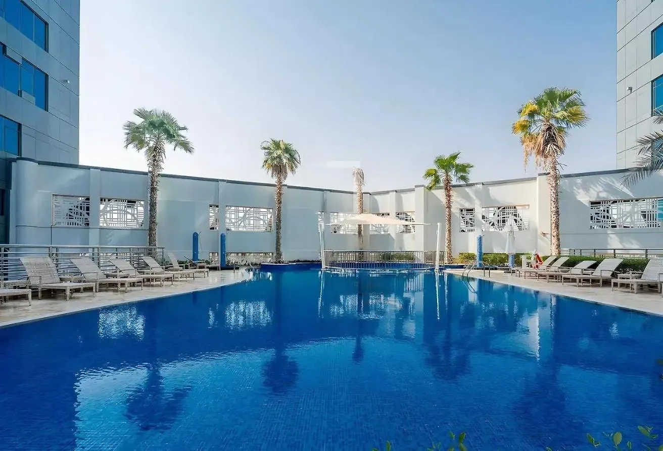 Spacious 1Br - Balcony & Pool View - Capital Bay Dubai Apartment